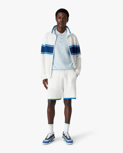 Polo à manches courtes monogramme ajouré bleu
