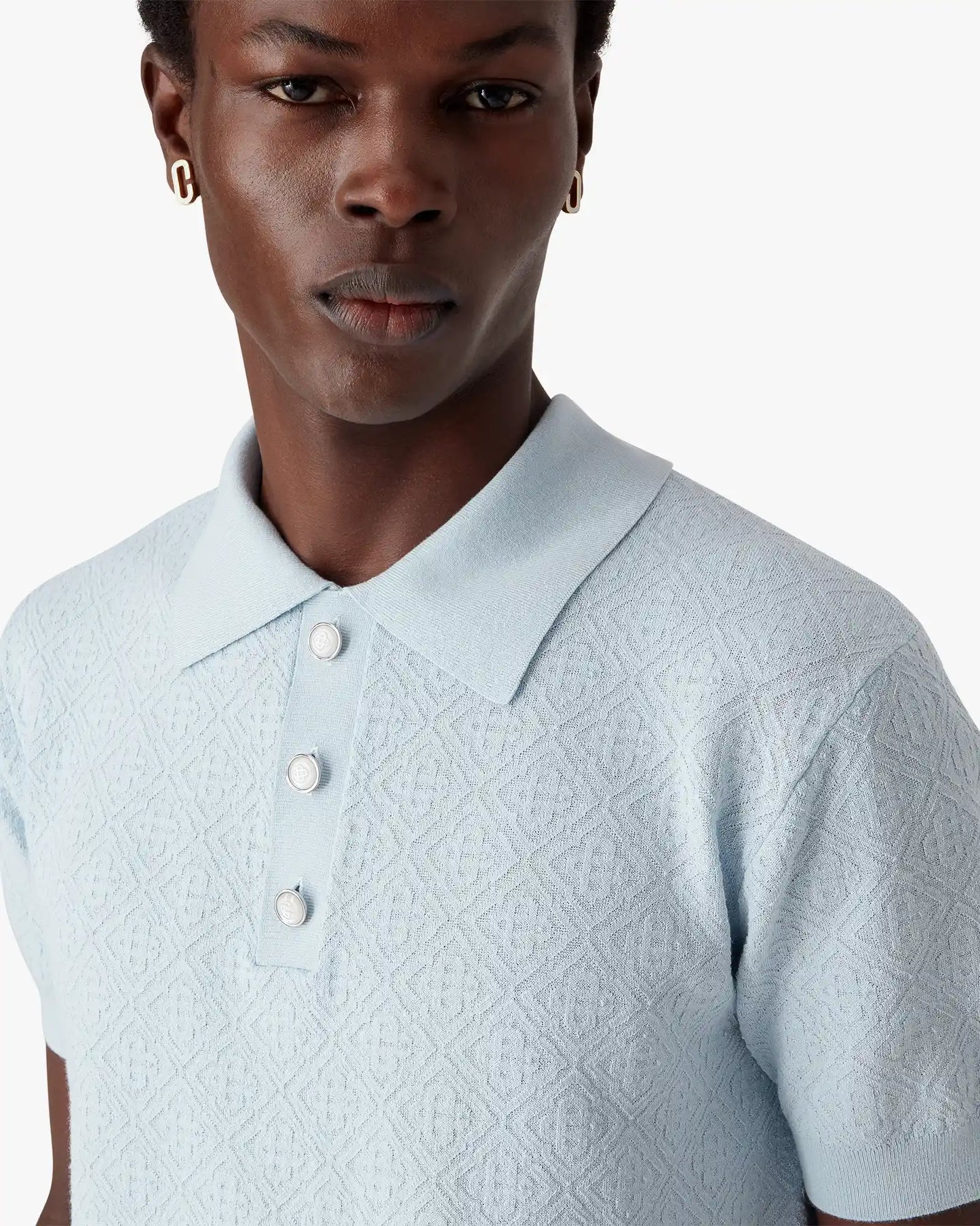 Polo à manches courtes monogramme ajouré bleu