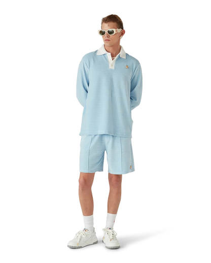 Polo en velours à rayures