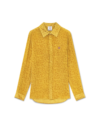 Chemise en soie à manches longues et motifs floraux dévorés