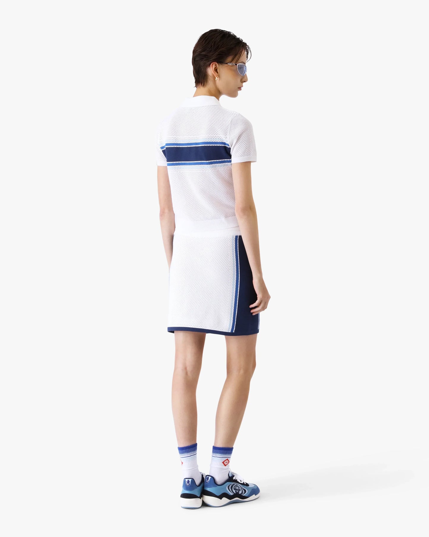 Polo en maille rayée blanc et bleu