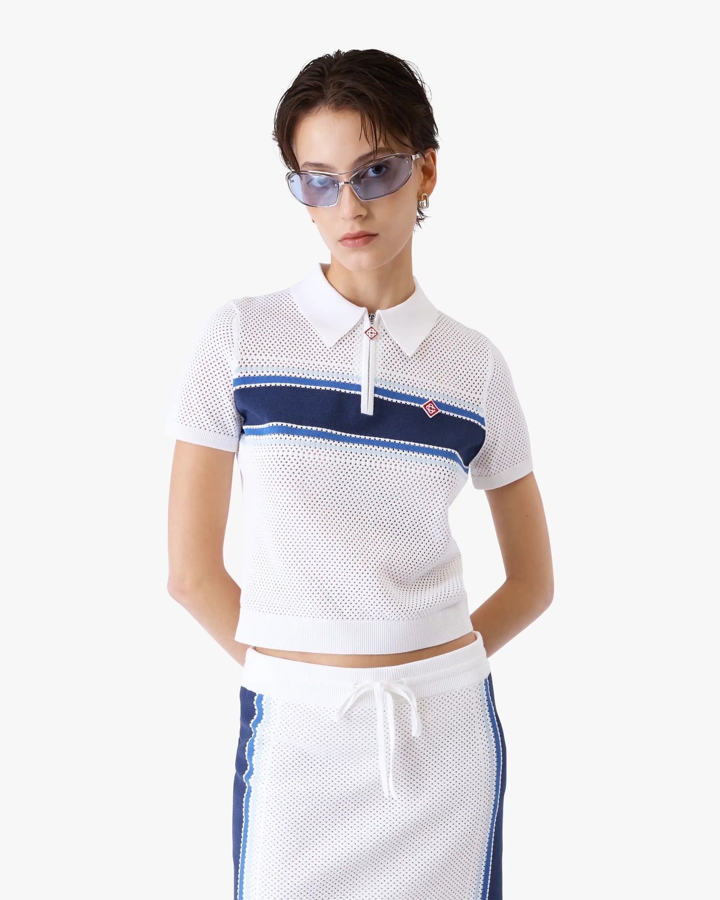 Polo en maille rayée blanc et bleu