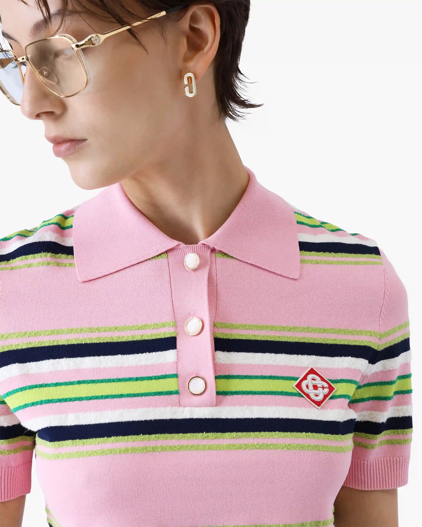 Polo ajusté à rayures roses et vertes